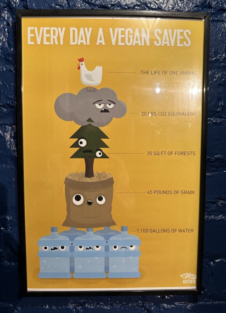 Every Day A Vegan Saves… poster at Cashew in Chattanooga, Tennessee, USA.